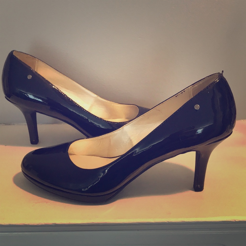 Etienne Aigner black pumps